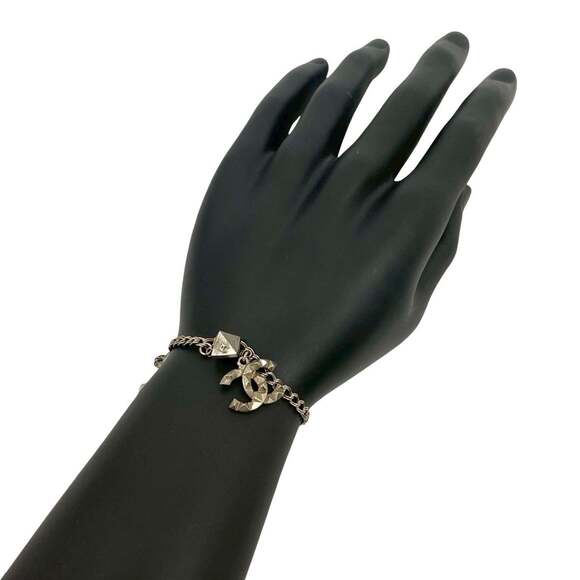 CHANEL Silver Logo Charm Bracelet